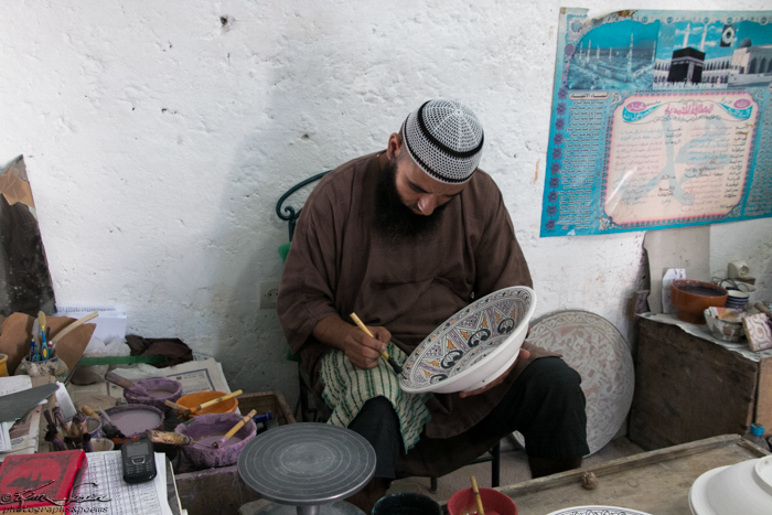Fez, Morocco 10-13-2014: Then painting the design.