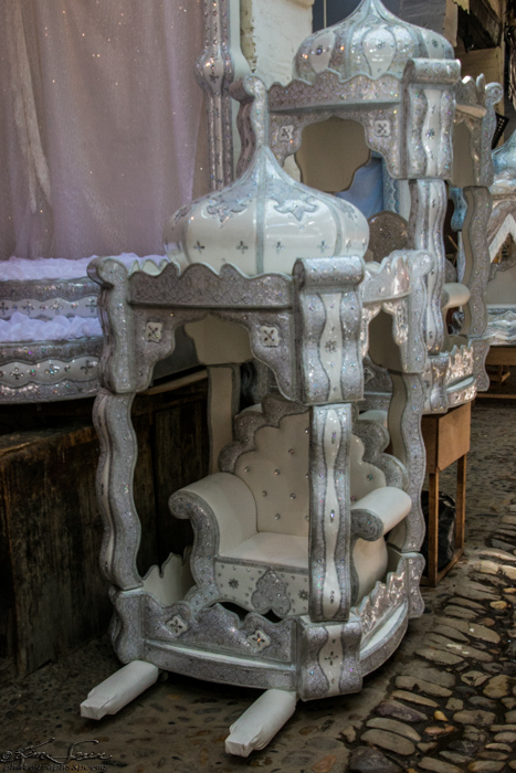 Fez, Morocco 10-13-2014: A booth selling wedding items - a silver jeweled carrier for the bride!