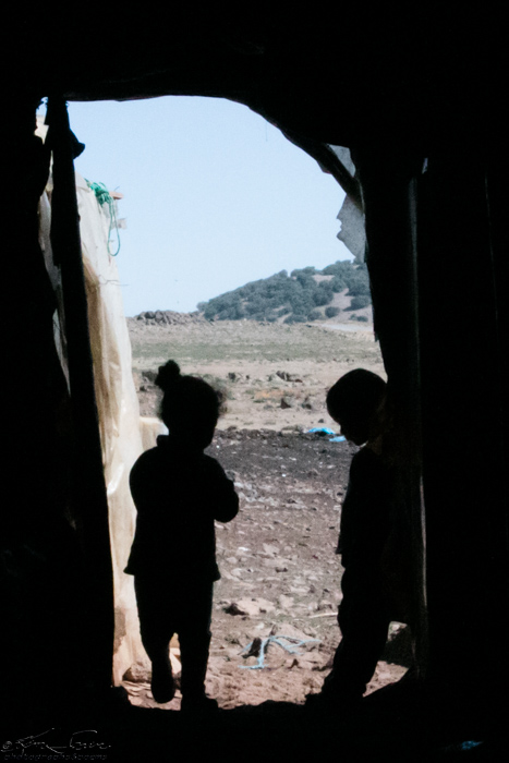 Middle Atlas Mountains, Morocco 9-14-14, Semi-Nomad Family: The children outlined in the doorway.