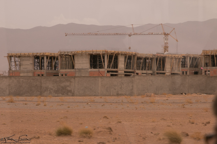 Drive to Erfoud, Morocco 9-14-14: Interesting piece of equipment working on these structures.