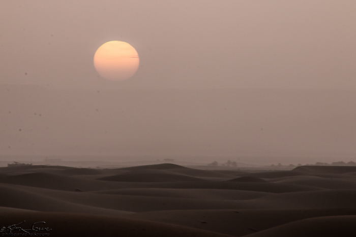 Morocco 9-15 to 17-2014, Morocco 9-15 to 9-17-2014, Sahara near Merzouga: Yes!  Above the clouds, a red sun shows up at last.