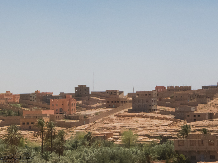 A Day in the Life, Morocco 9-18 -2014, Tineghir: New construction in the other direction.  I find the combination of ghost town of unused buildings and new construction odd.