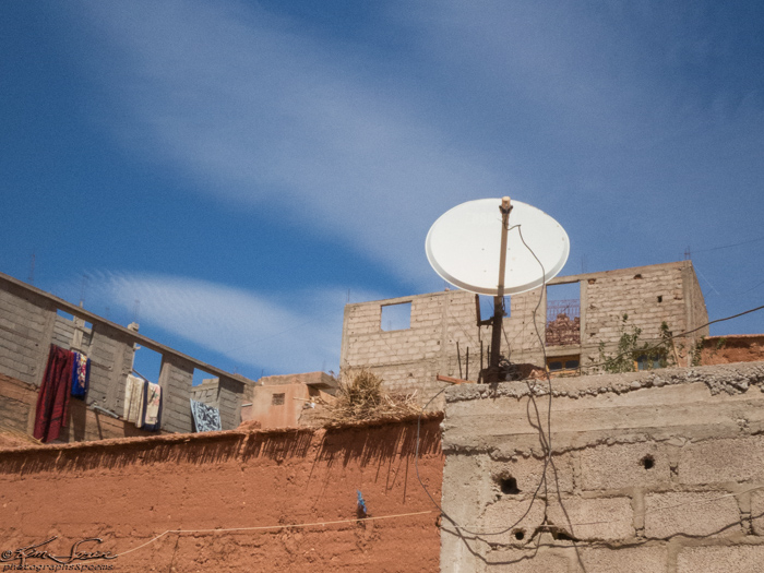 A Day in the Life, Morocco 9-18 -2014, Tineghir: His pleasant home is in an old residential area, with a TV dish on top of the new restrooms.