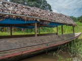 Peruvian Amazon Region, covered boat - plastic, thatch, and might have a bit of tin along the top.