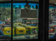 Delhi: Last photo of crowded streets for while.  Our bus driver was amazing! The yellow tops are 3-wheeler taxis.