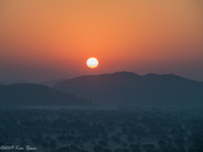 Jaipur: Balloon Ride over the countryside - magical sunrise with fog in the trees.