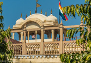 Jaipur: City Palace.  The flag indicates that the King is in, so who knows, that might be he in the pink shirt!