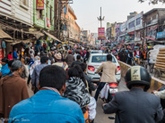 Varanasi - My driver/bike rider (blue jacket in foreground) has to get through that!
