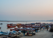 Hindu Holy River Ganga: The plan is to get into one of these boats to view the daily cremation and the Ganga Aarti (fire as offering) ceremony.