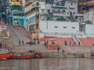 Ghats on the Ganges: View of another ghat upstream a bit.  Many houses and apartments and hotels line the shore.