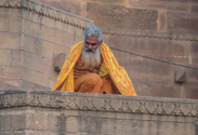 Varanasi: Closer view of the old man preparing for the sunrise.