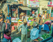 Varanasi: A drive by the farmer's market, where food comes from the farm early each morning and is then distributed throughout the city by vendors.