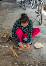 A few of the activities in the village:  weaving baskets from the bamboo.