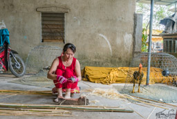 Early stages of the basket - preparing the bamboo.  The rooster apparently has been fighting!