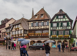Houses and businesses in Obernai showing off the half-timbered structures and LOTS of flowers.