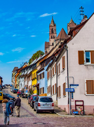 Breisach's colorful houses below the church on the hill.